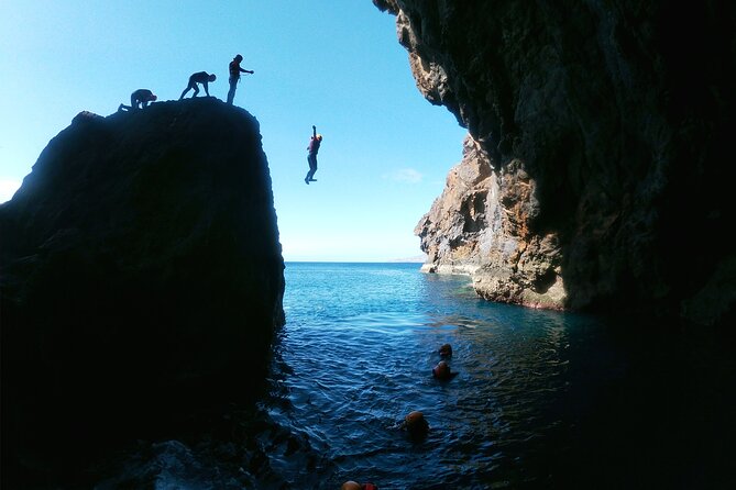 Coasteering Tour - Cliff jumping, swimming, scrambling. - Swimming, snorkeling, and cave exploration along the waterline