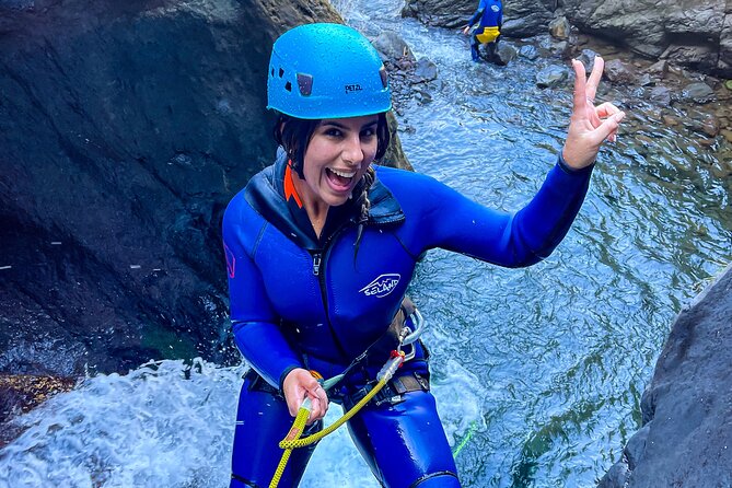 Madeira Canyoning Intermediate - The Core Action Flow: Rappels, Natural Slides, and Pool Jumps