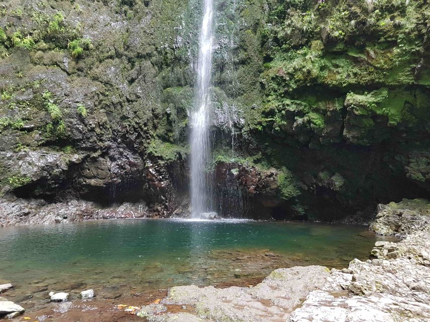 Madeira: Private Guided Levada Caldeirão Verde Walk PR9 - Water everywhere: São Jorge viewpoints, gushing walls, levada flow, and rainy days