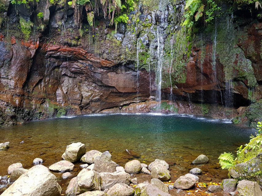 Small Group Walks Rabaçal 25 Fontes - The tunnel, wet footing, and narrow single-file moments