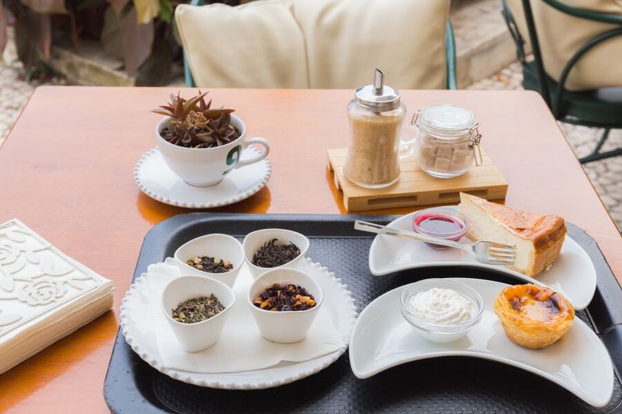 Taste Funchal: food, wine and cultural tour - Market hall stops: fruit, honey cake, cookies, and custard tarts