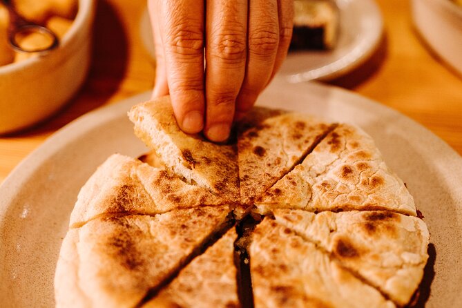 The Espetada Evening Food and Cultural Tour - Stop One in Funchal: Venezuelan Bites That Explain the Connection